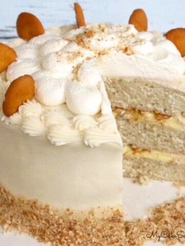 Sliced Banana Pudding Cake on a cake pedestal.