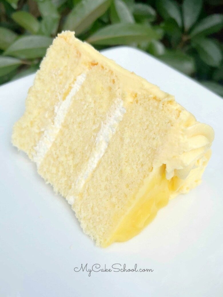 Slice of Lemon Velvet Cake on a plate.