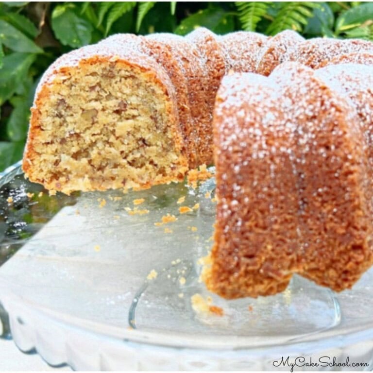 Vanilla Wafer Cake, sliced, on a cake plate.