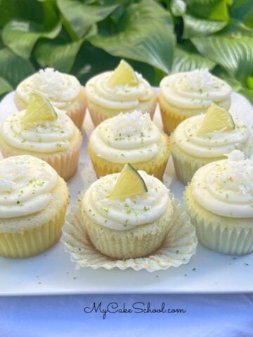 Lime cupcakes on a platter.