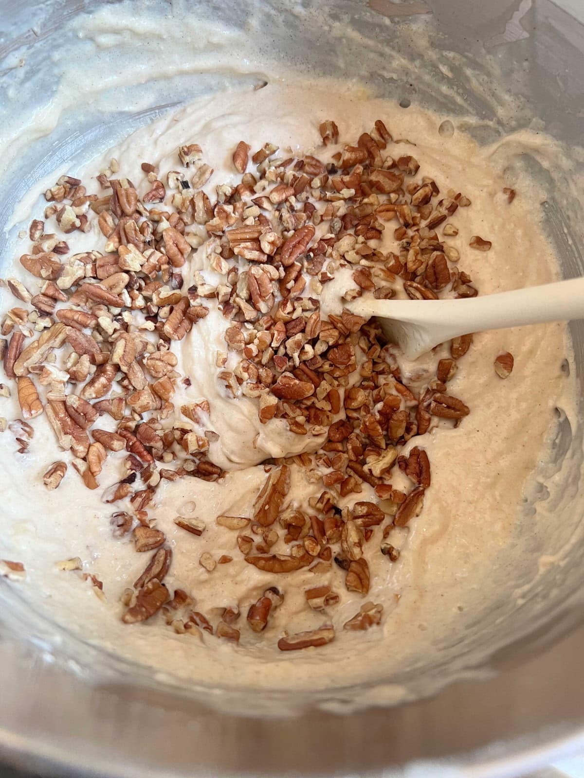 Banana Nut Cake Batter- Folding in the pecans.