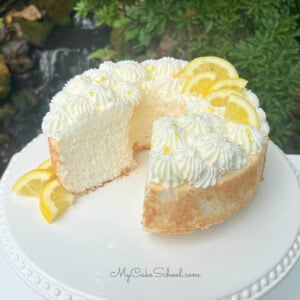 Sliced Lemon Angel Food Cake on a cake pedestal.