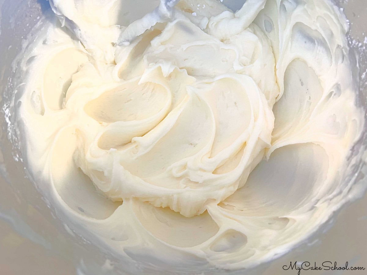 Mixing bowl of Almond Cream Cheese Frosting.