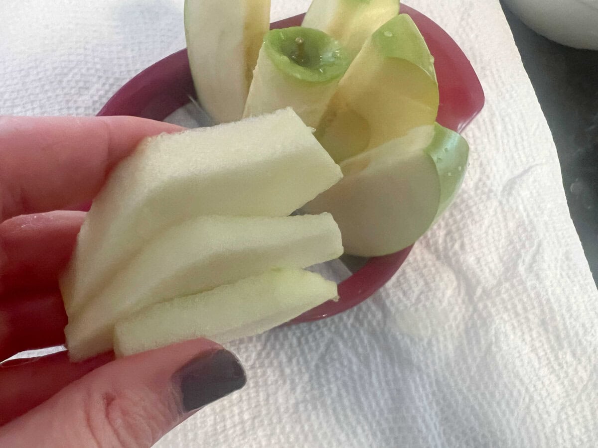 Apple section sliced to approximately ¼ inch or so.