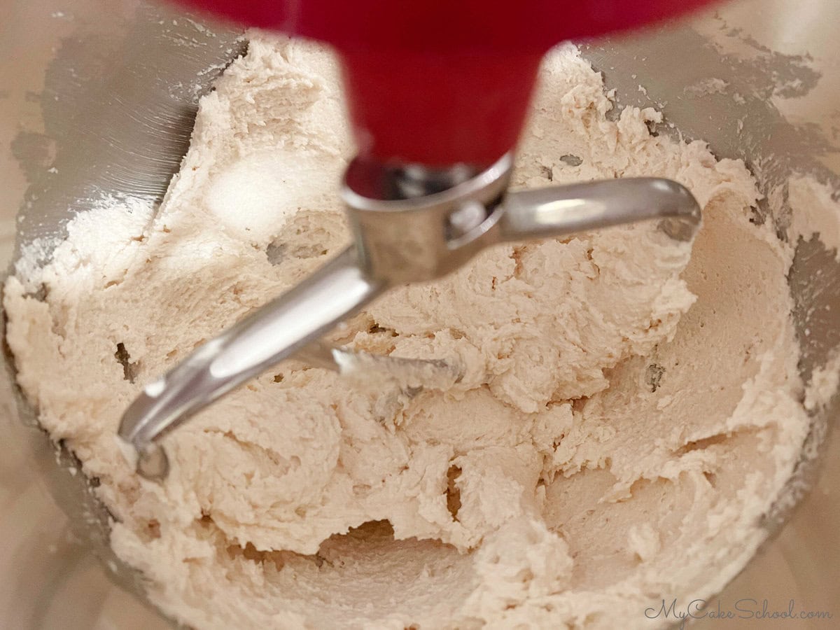 Mixing the butter and sugar.