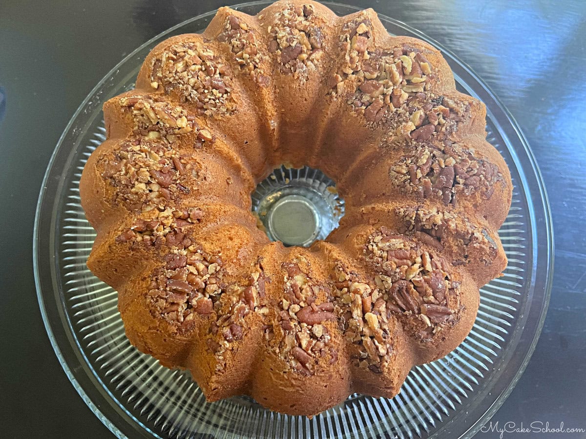 Fresh baked Sweet Potato Pound Cake on a cake pedestal.