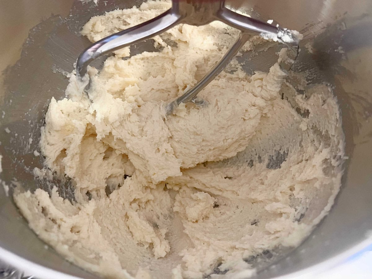 Beating the Butter and Sugar in mixing bowl.