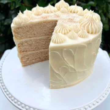 Cinnamon Cake, sliced, on cake pedestal.