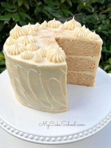 Cinnamon Cake, sliced, on pedestal.