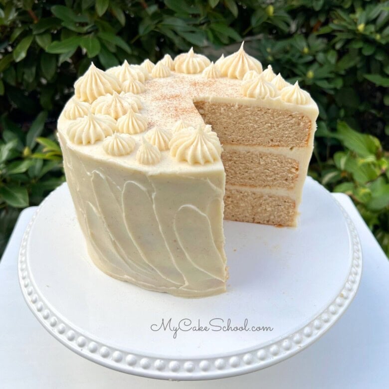 Cinnamon Cake, sliced, on pedestal.