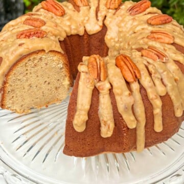 Praline Pound Cake, sliced, on a cake pedestal.