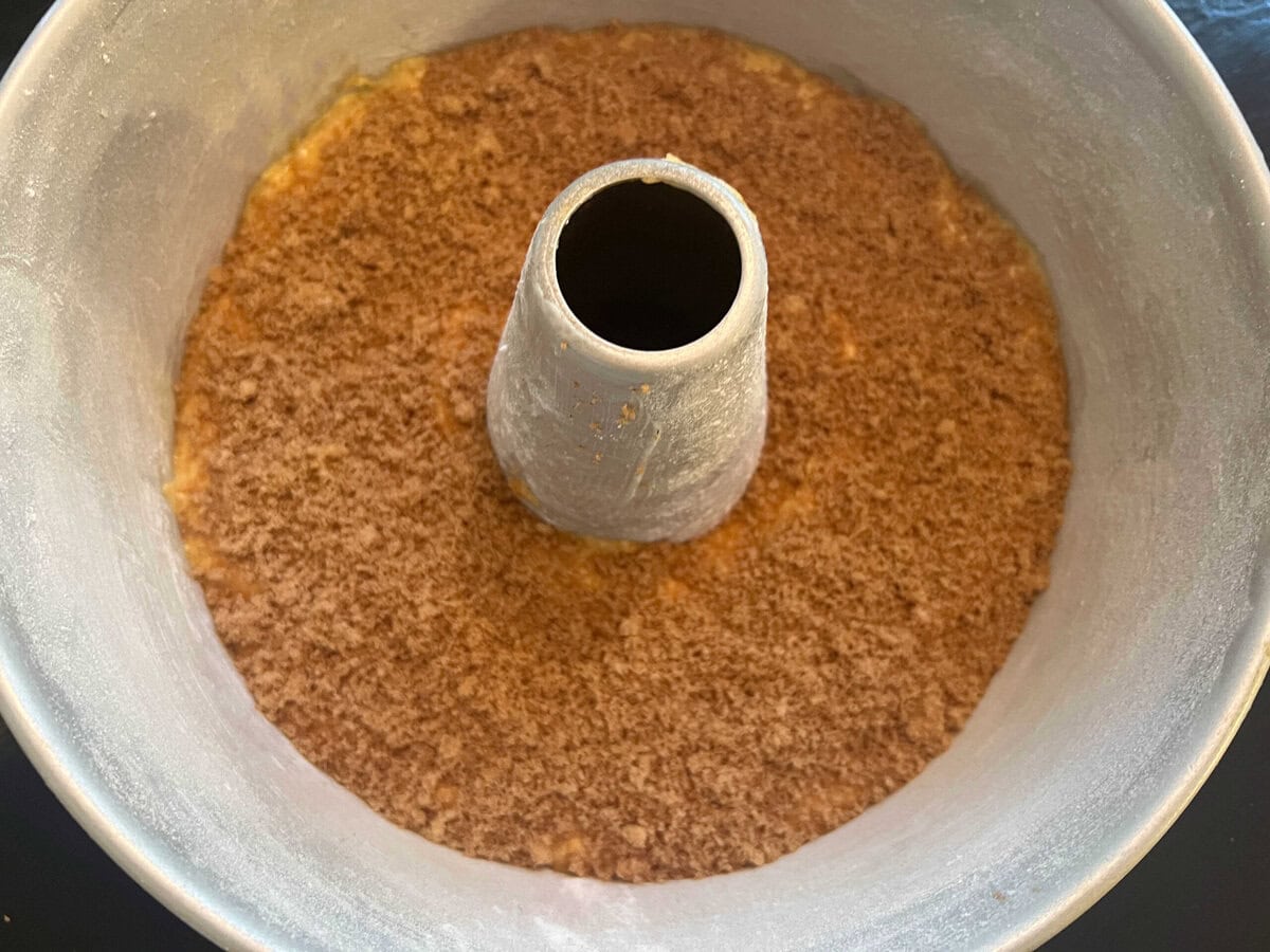 Half of batter in prepared pan, sprinkled with brown sugar and cinnamon mixture.