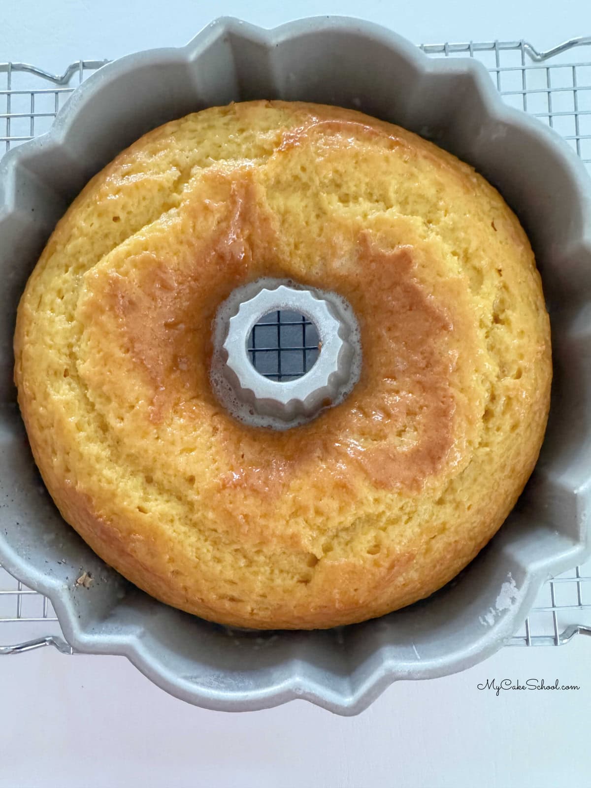 Cake after the glaze has been poured over it, while still in the bundt pan.