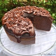 Chocolate Ricotta Cake, sliced, on a cake plate.