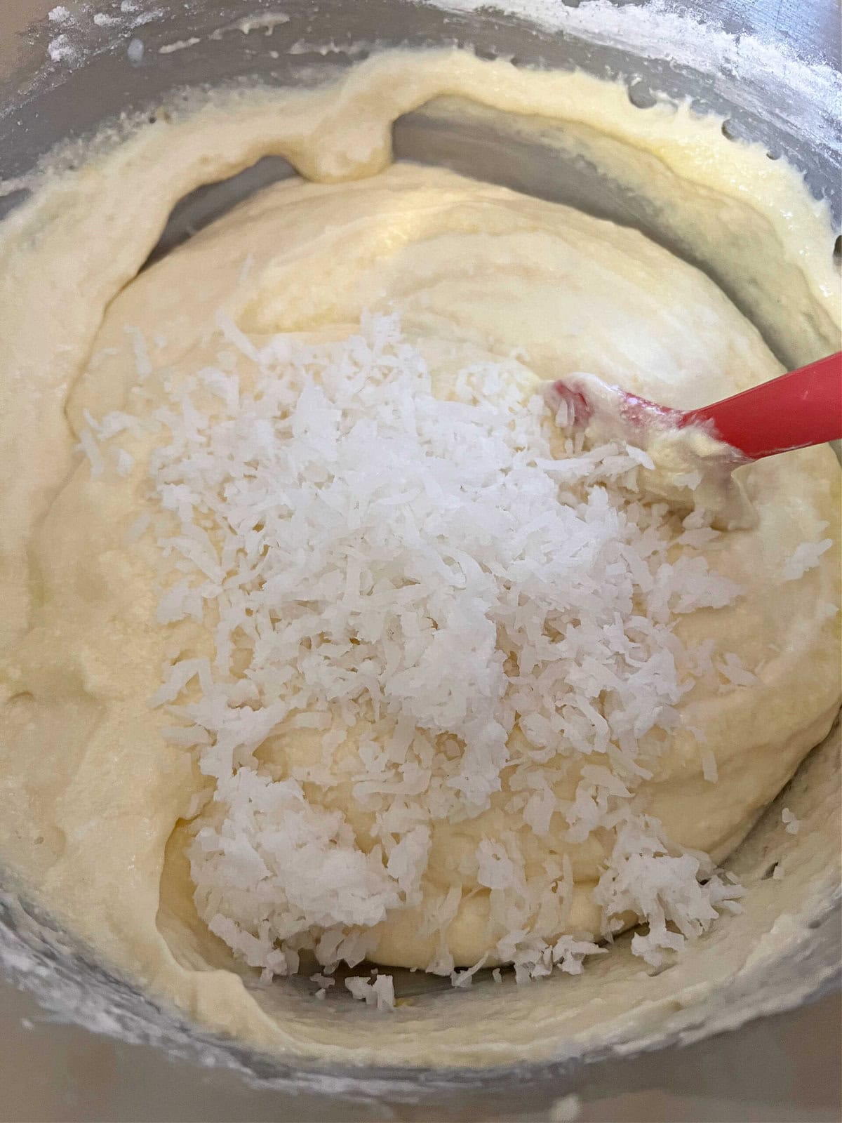 Lemon Coconut Cupcake Batter in a mixing bowl.