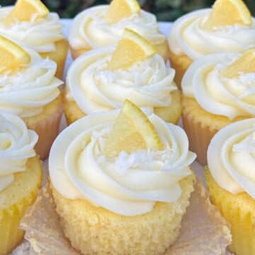 Lemon Coconut Cupcakes on a plate.