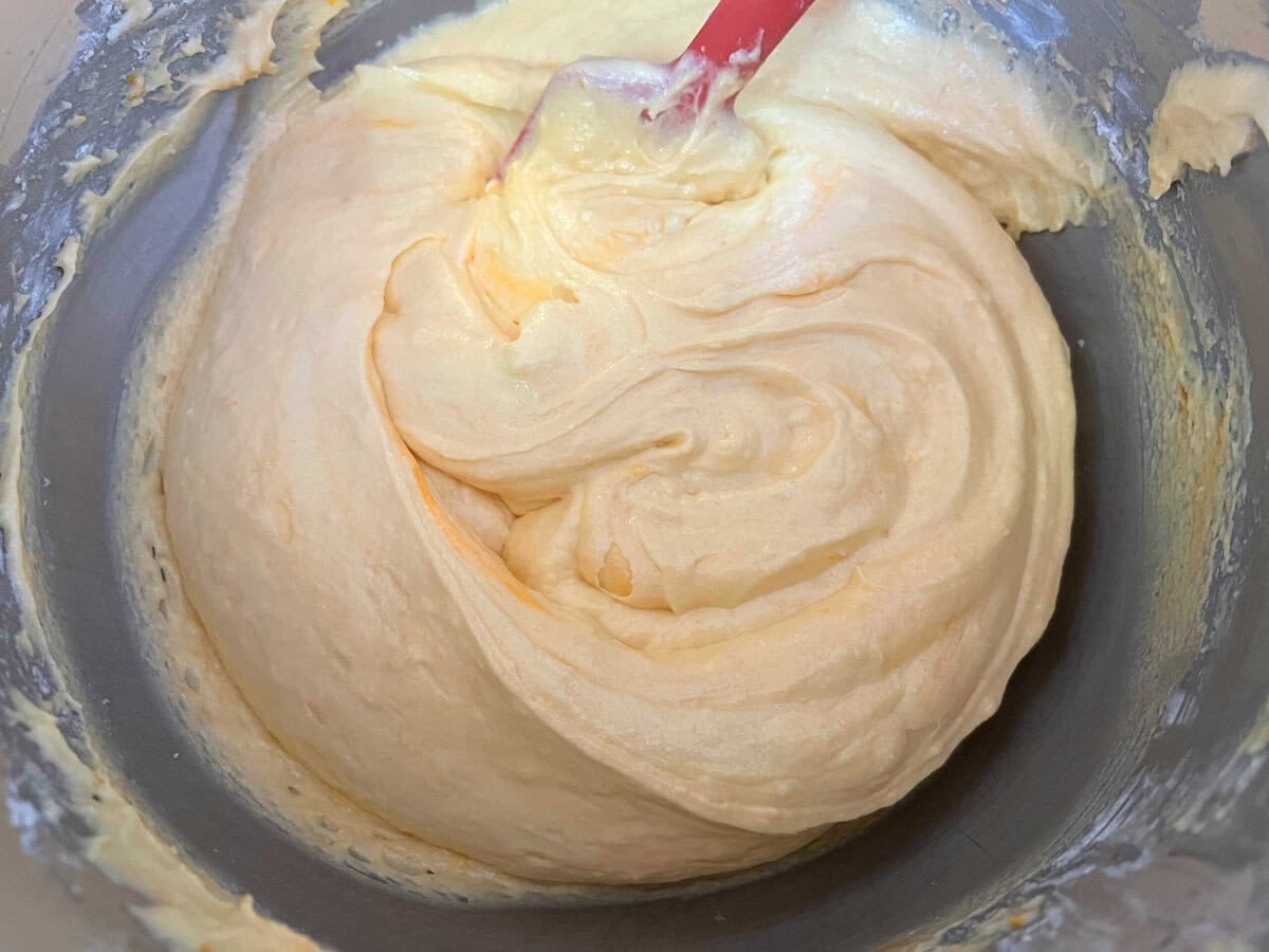 Orange Cupcake Batter in a mixing bowl.