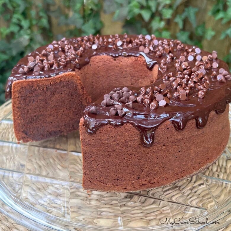 Chocolate Sour Cream Pound Cake, sliced, on a cake platter.