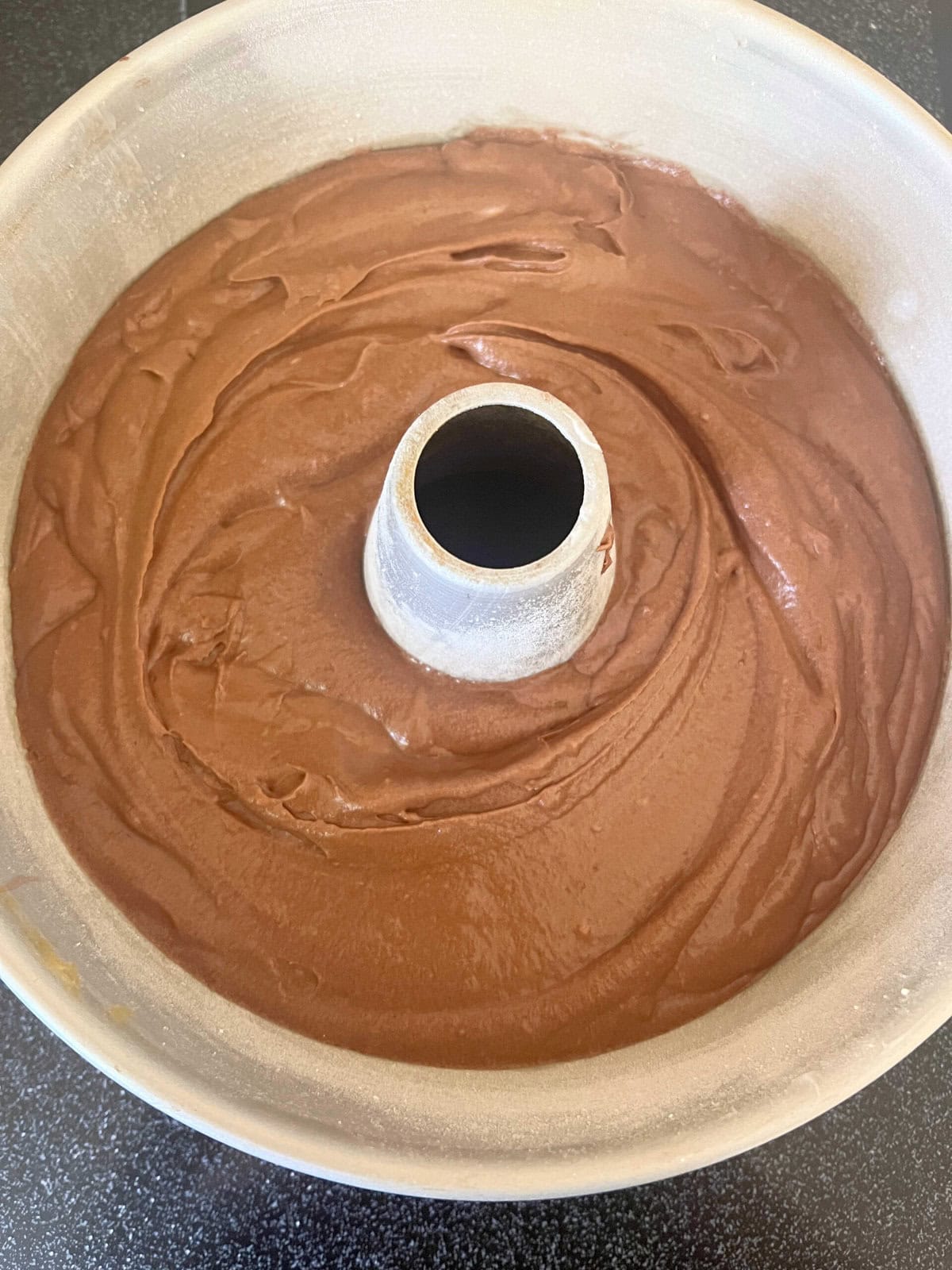 Bundt pan filled with cake batter.