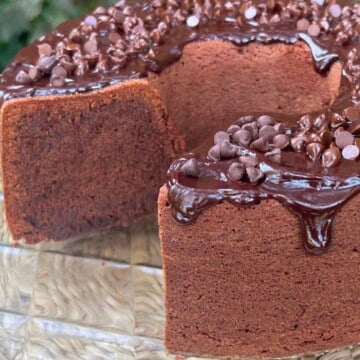 Chocolate Sour Cream Pound Cake, sliced, on a cake pedestal.