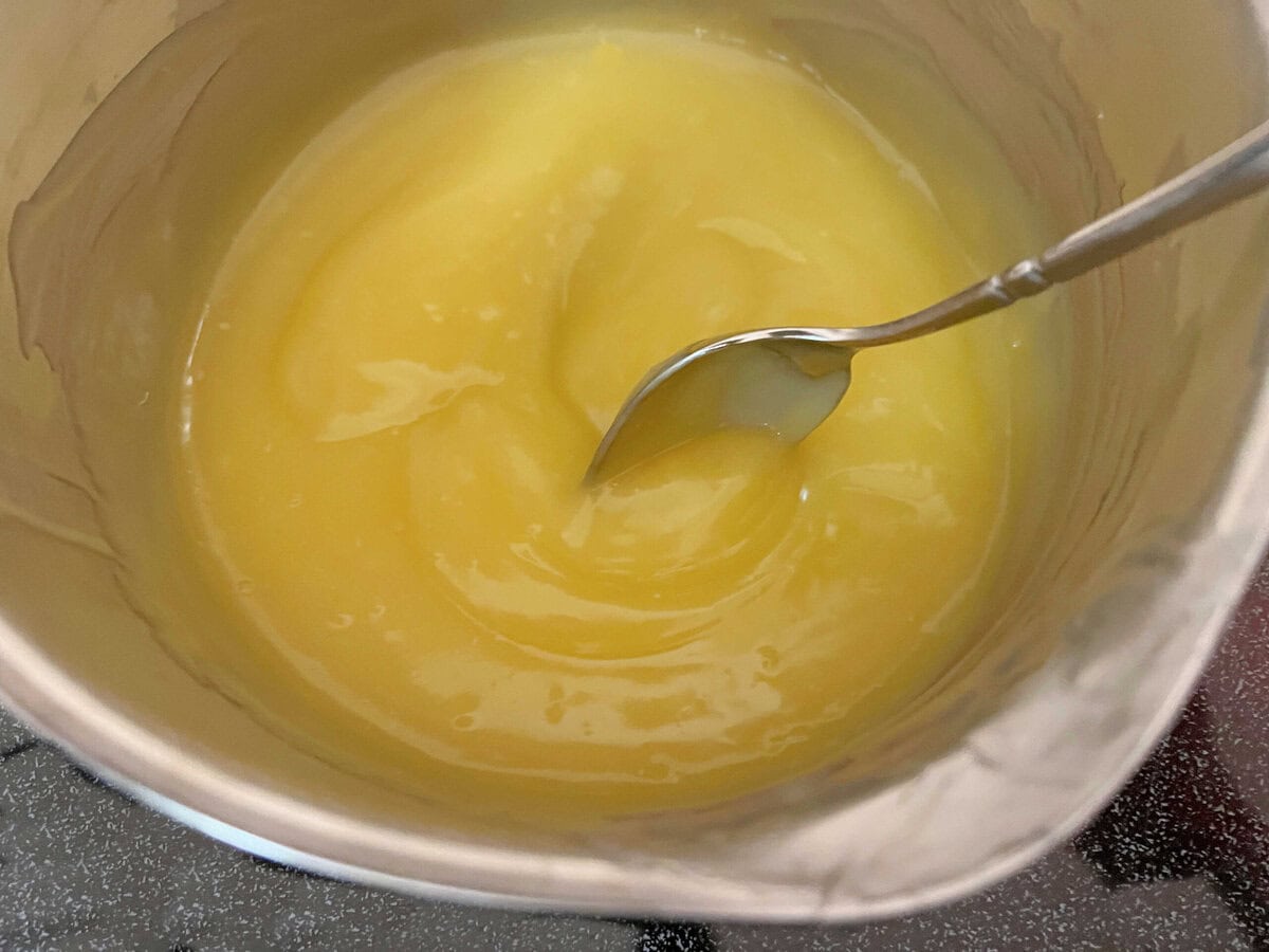 Key Lime Curd in a saucepan.