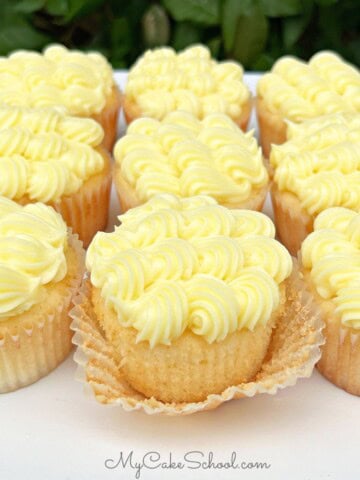 Lemonade Cupcakes on a cake platter.