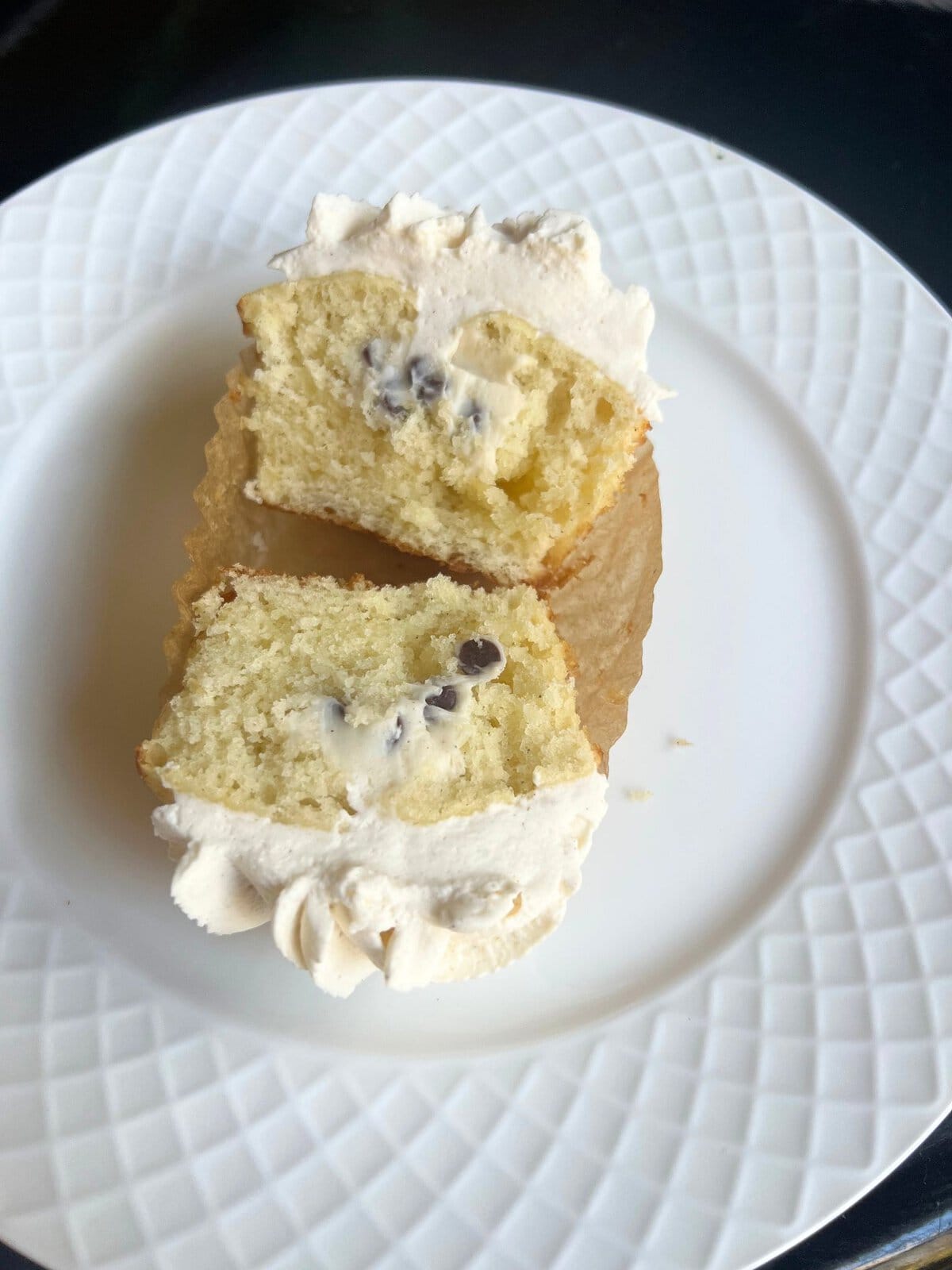 Cannoli cupcake sliced in half