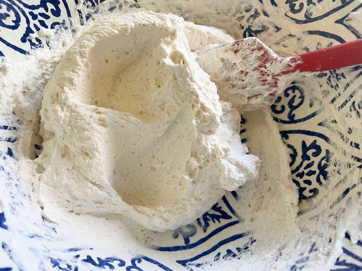 Mascarpone Whipped Cream frosting in a bowl.