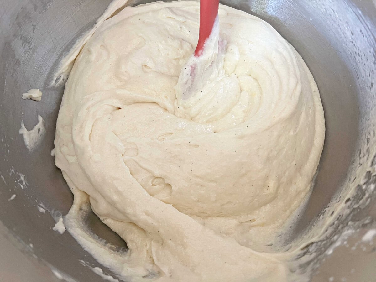 Vanilla cupcake batter in a mixing bowl.